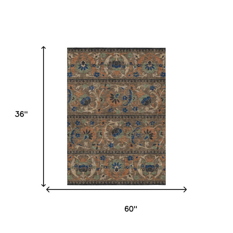 Multicolor floral area rug, 60 in x 36 in, textured weave with blue and orange details
