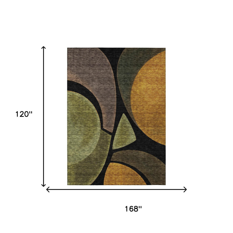 Abstract indoor/outdoor rug with multicolor curved shapes in brown, green, gold, black.