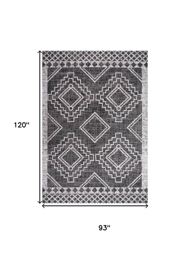 Moroccan geometric area rug in black and ivory, 93 in x 120 in, diamond pattern.