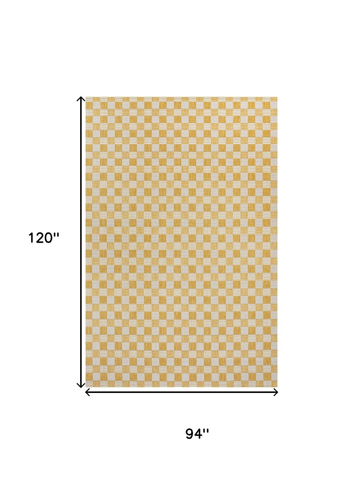 8x10 yellow and cream geometric grid area rug with outlined border