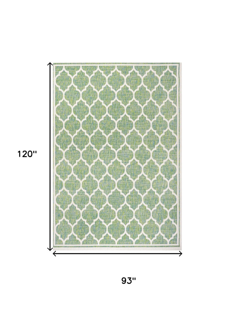 Geometric area rug dimensions: 8 ft x 10 ft; green and cream lattice pattern