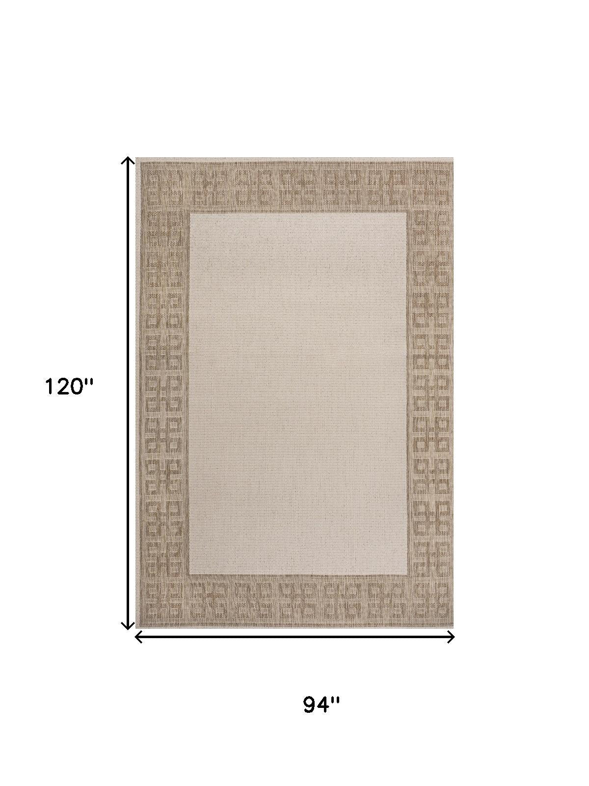 Cream and beige area rug, 94 x 120 inches, Greek key border with light center
