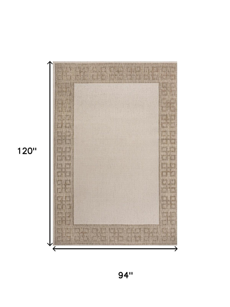 Cream and beige area rug, 94 x 120 inches, Greek key border with light center