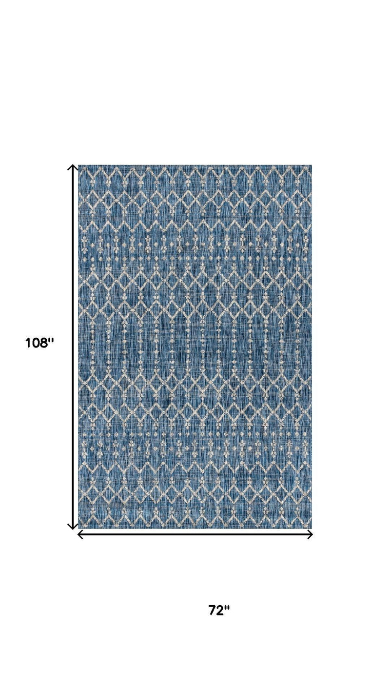 Navy blue trellis area rug, 72 in x 108 in, with light gray geometric pattern
