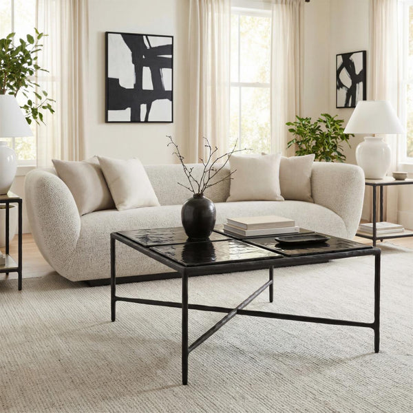 Black square glass coffee table with aluminum frame and four-part glass top, 31 in