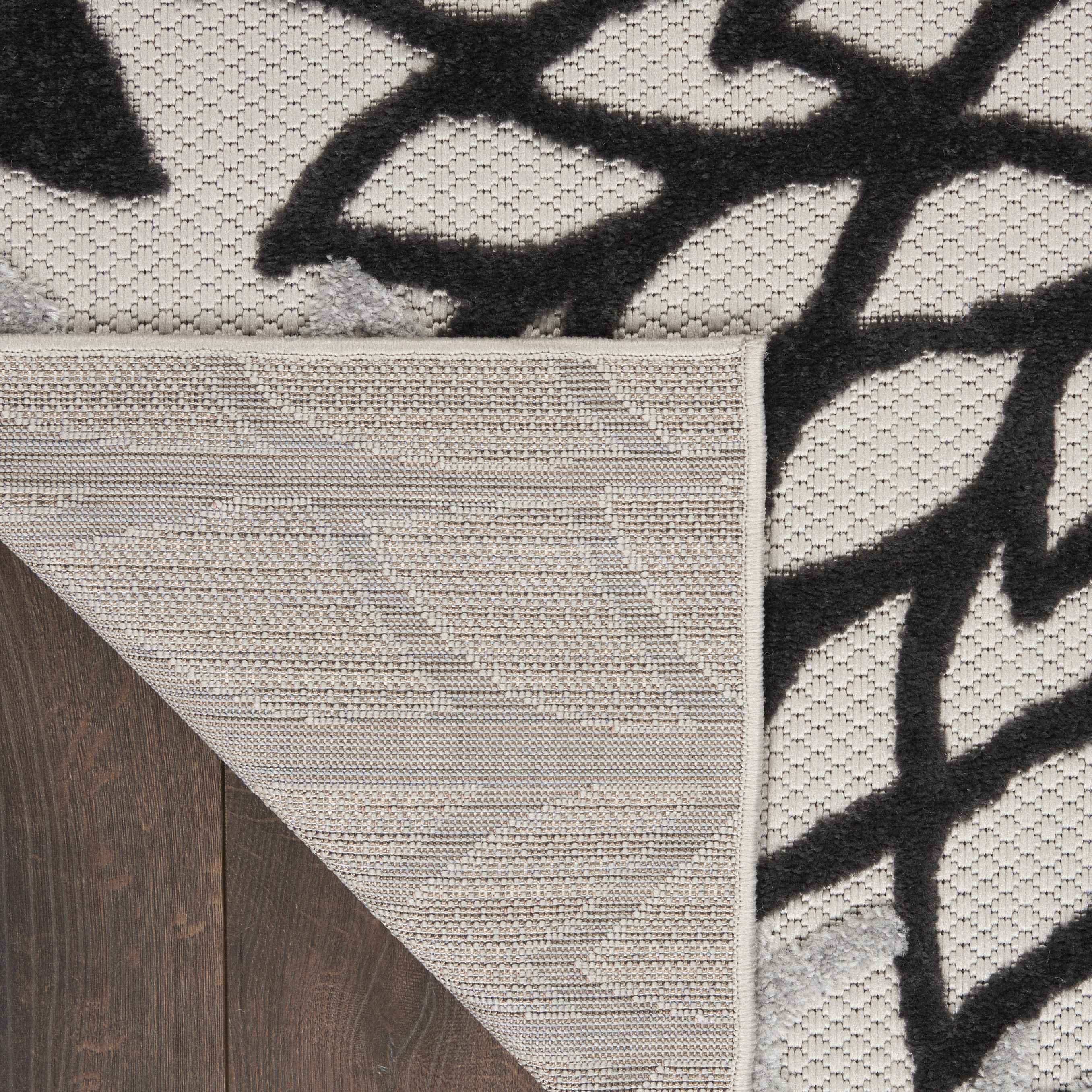7' X 10' Black And White Handmade Indoor Outdoor Area Rug - Outdoor