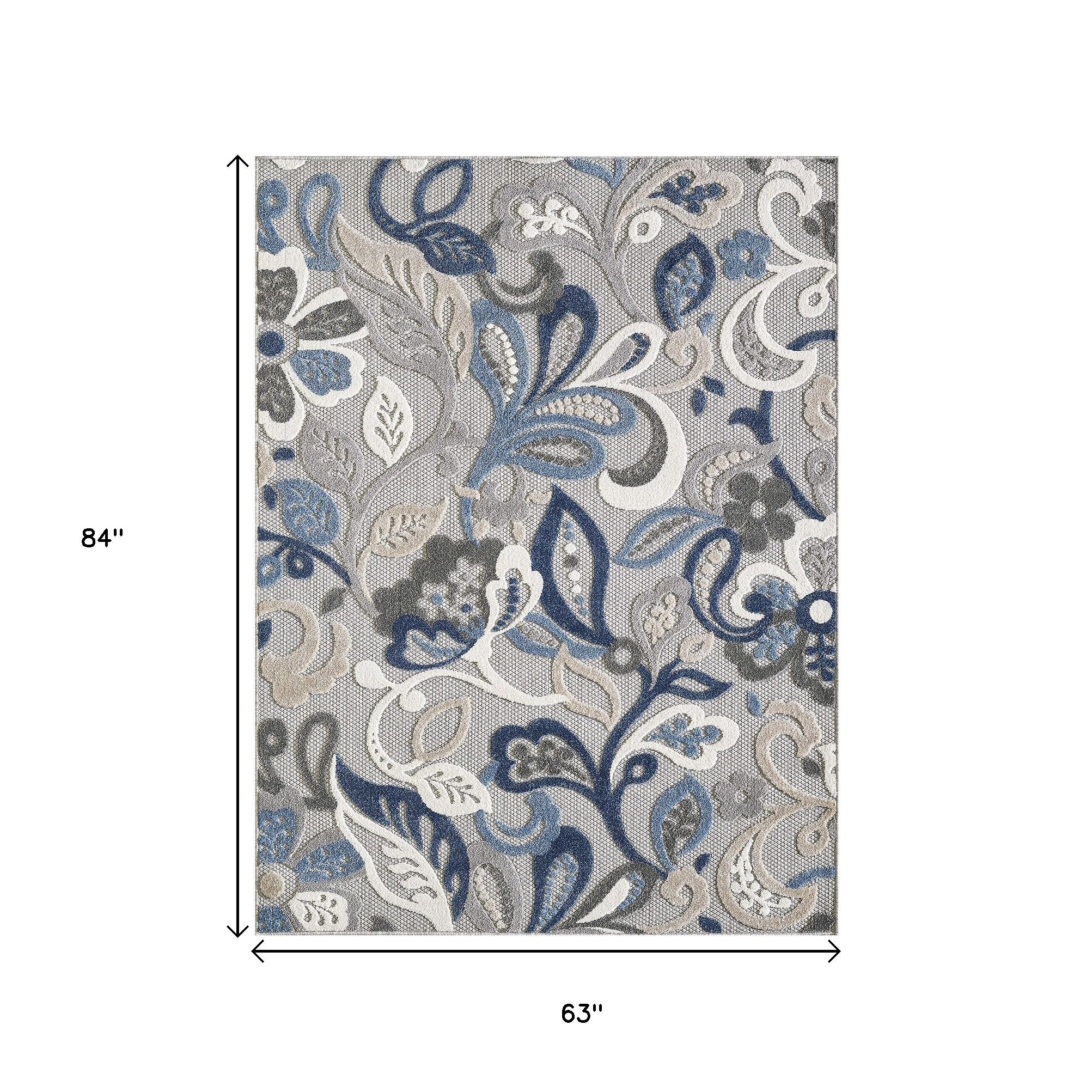 Indoor/outdoor area rug, rectangular gray base with blue and white floral pattern, top view