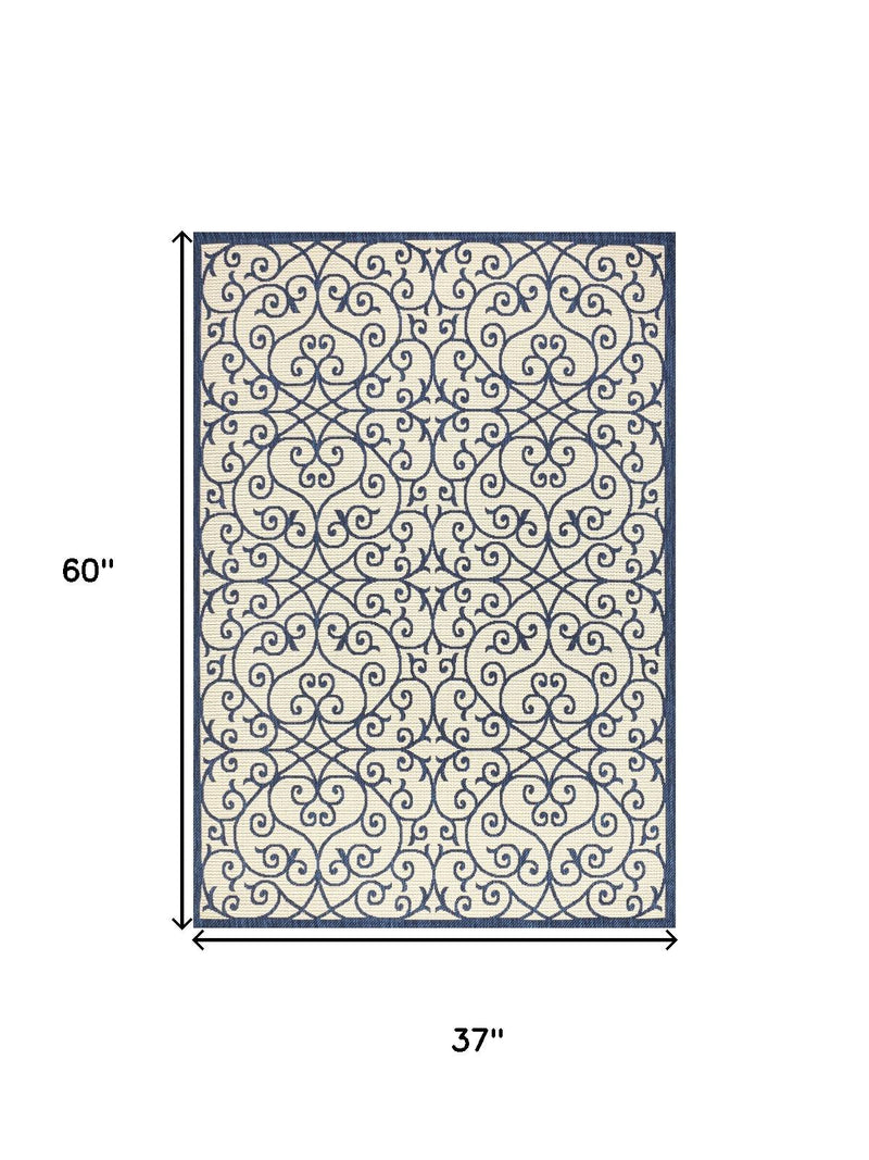 Navy and beige geometric area rug, 60 x 37 in