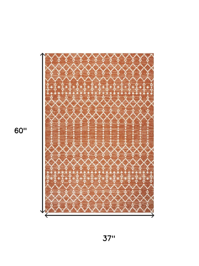 Orange and cream trellis area rug, 60 in x 37 in, diamond lattice pattern