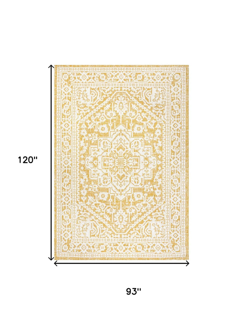 Yellow and cream medallion rug, 93 in by 120 in, ornate geometric border