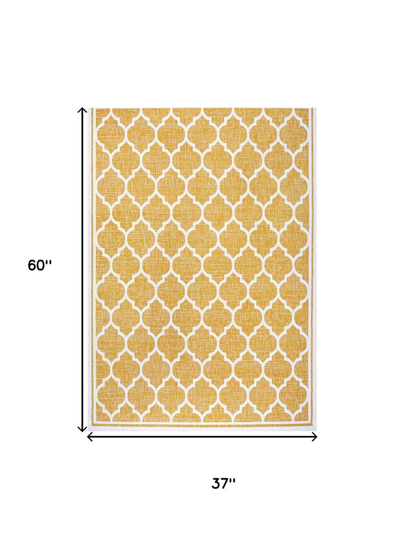 Geometric yellow and cream area rug, 60 in x 37 in, trellis pattern