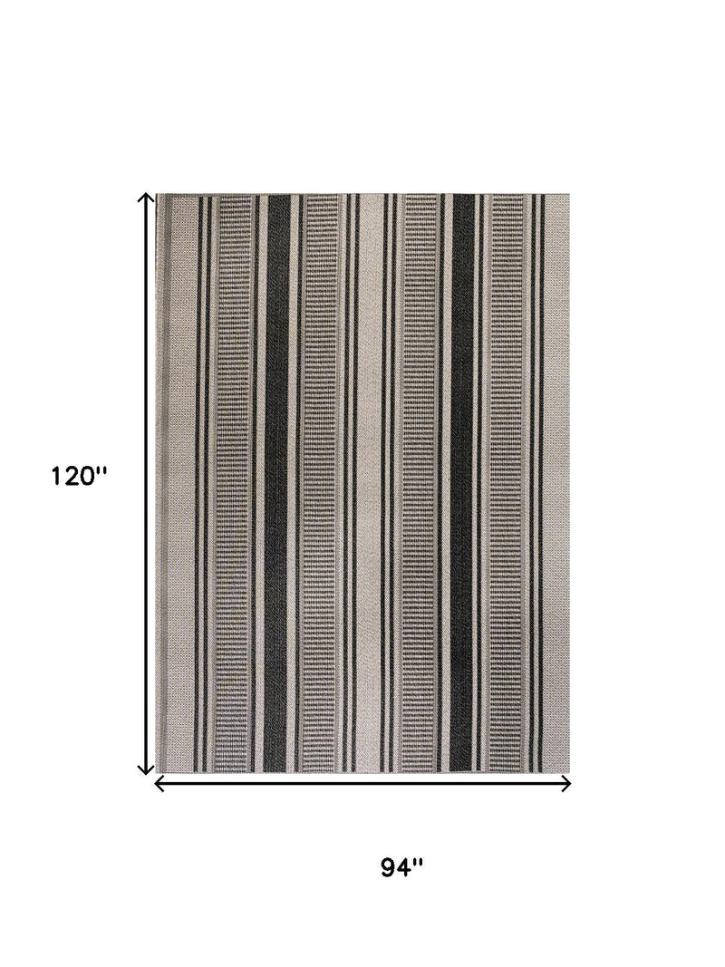 Rectangular striped area rug, 94 in by 120 in; vertical dark and beige bands