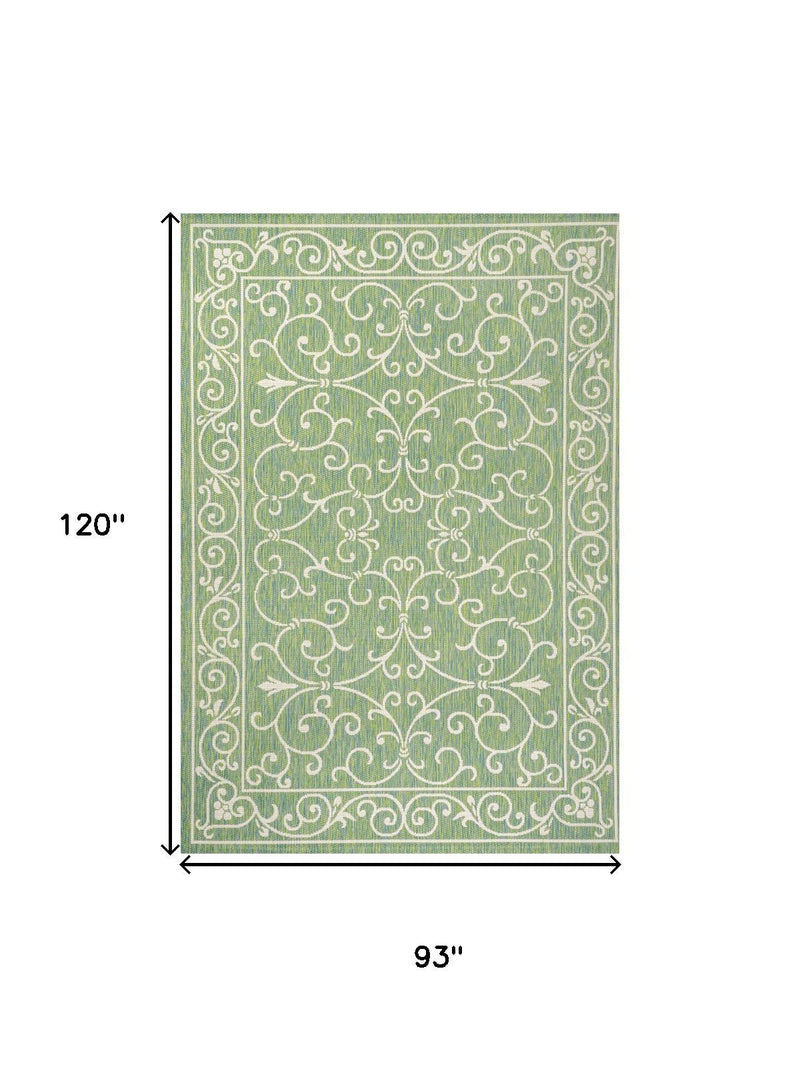 Green and ivory area rug pattern with dimensions 93 in by 120 in