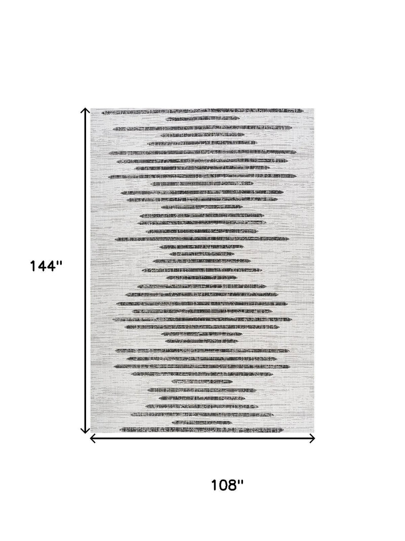 Ivory and black striped area rug, 108 in x 144 in dimensions