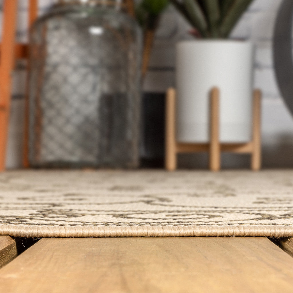 Round beige rug edge with flat woven texture on wooden floor, trimmed border