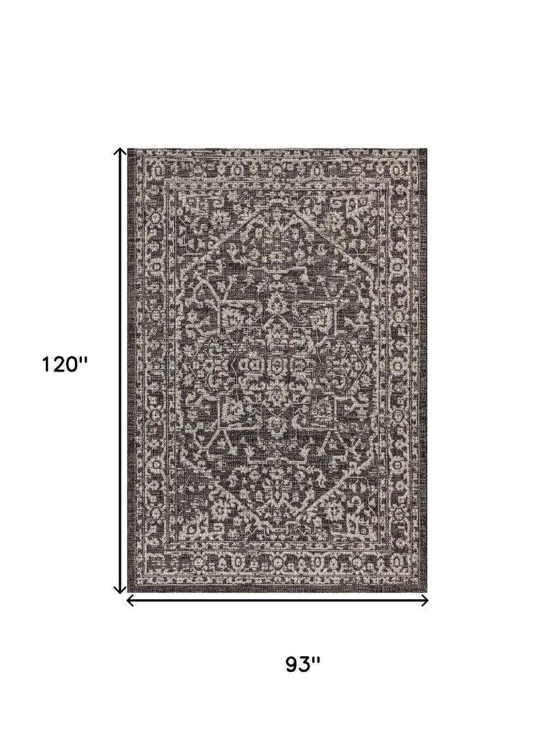 Indoor outdoor area rug, 93 in by 120 in, gray medallion pattern