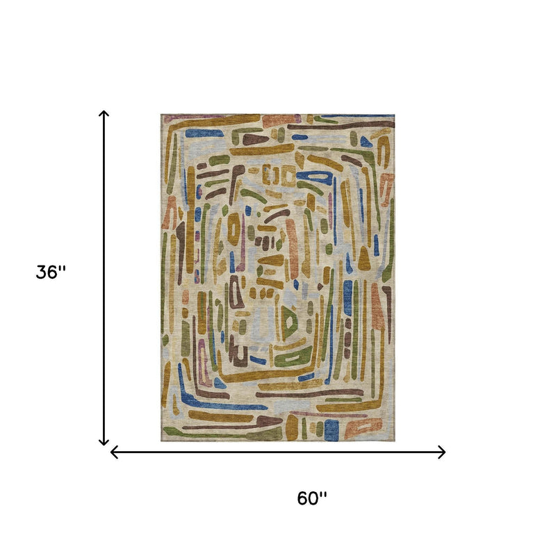 Beige and copper abstract area rug shown with 60 in wide and 36 in long measurements