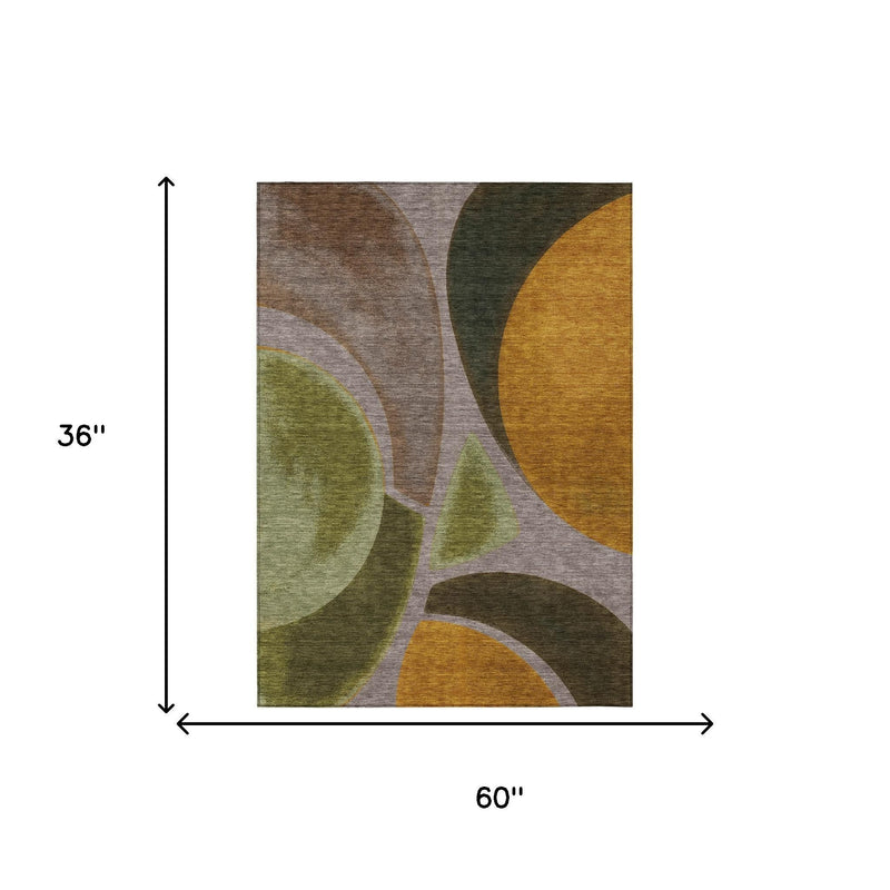Abstract area rug with dimensions 60 in by 36 in, taupe, green, brown pattern.