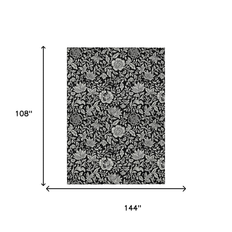 Rectangular black and ivory floral area rug, 108 x 144 in