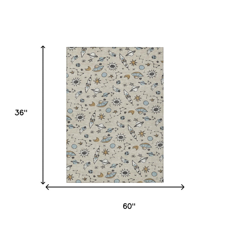 Beige and gray animal print area rug with space motifs, rectangular indoor/outdoor rug.