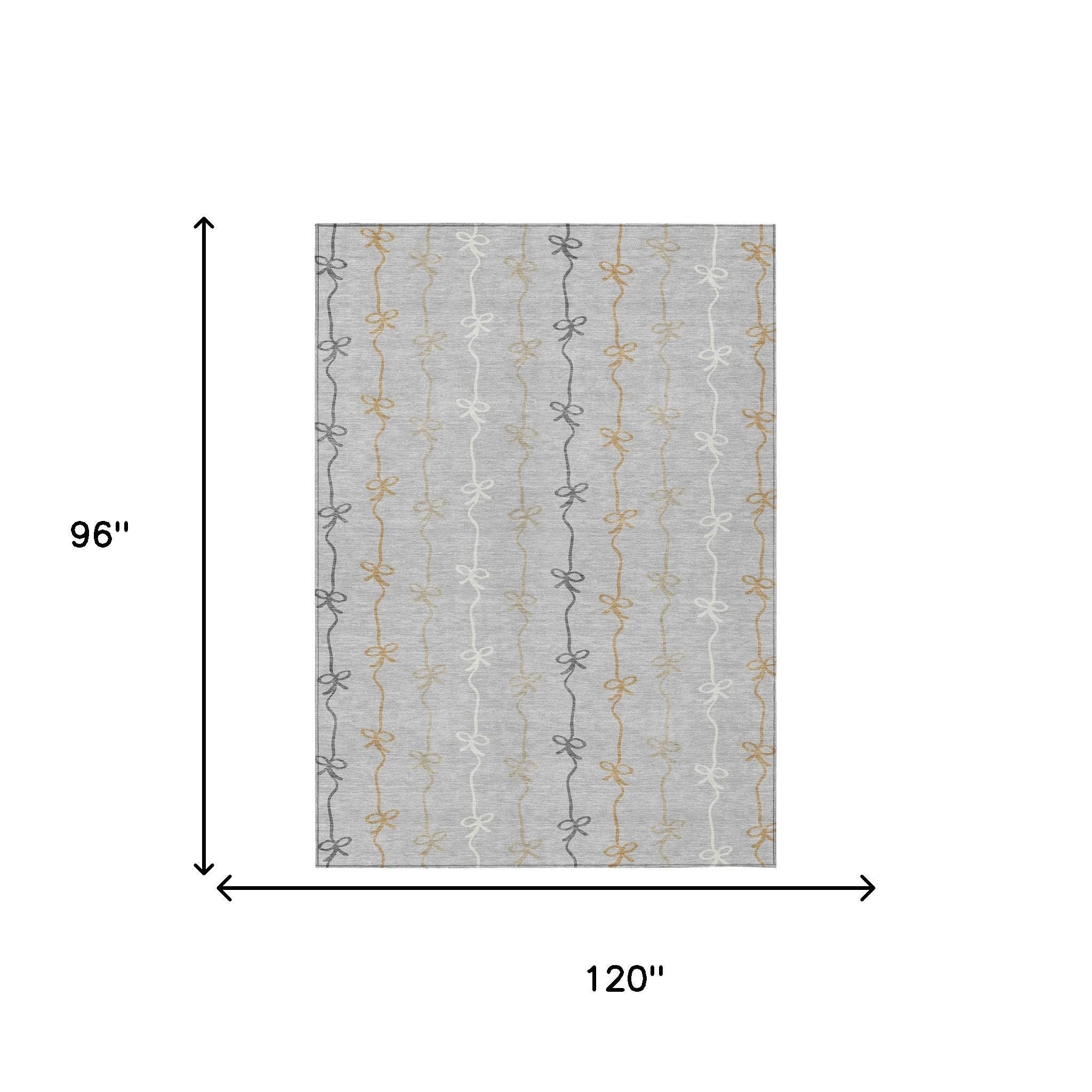 Gray tablecloth with colorful bow design in gold, silver, and black; measures 120" x 96". Perfect for elegant dining.