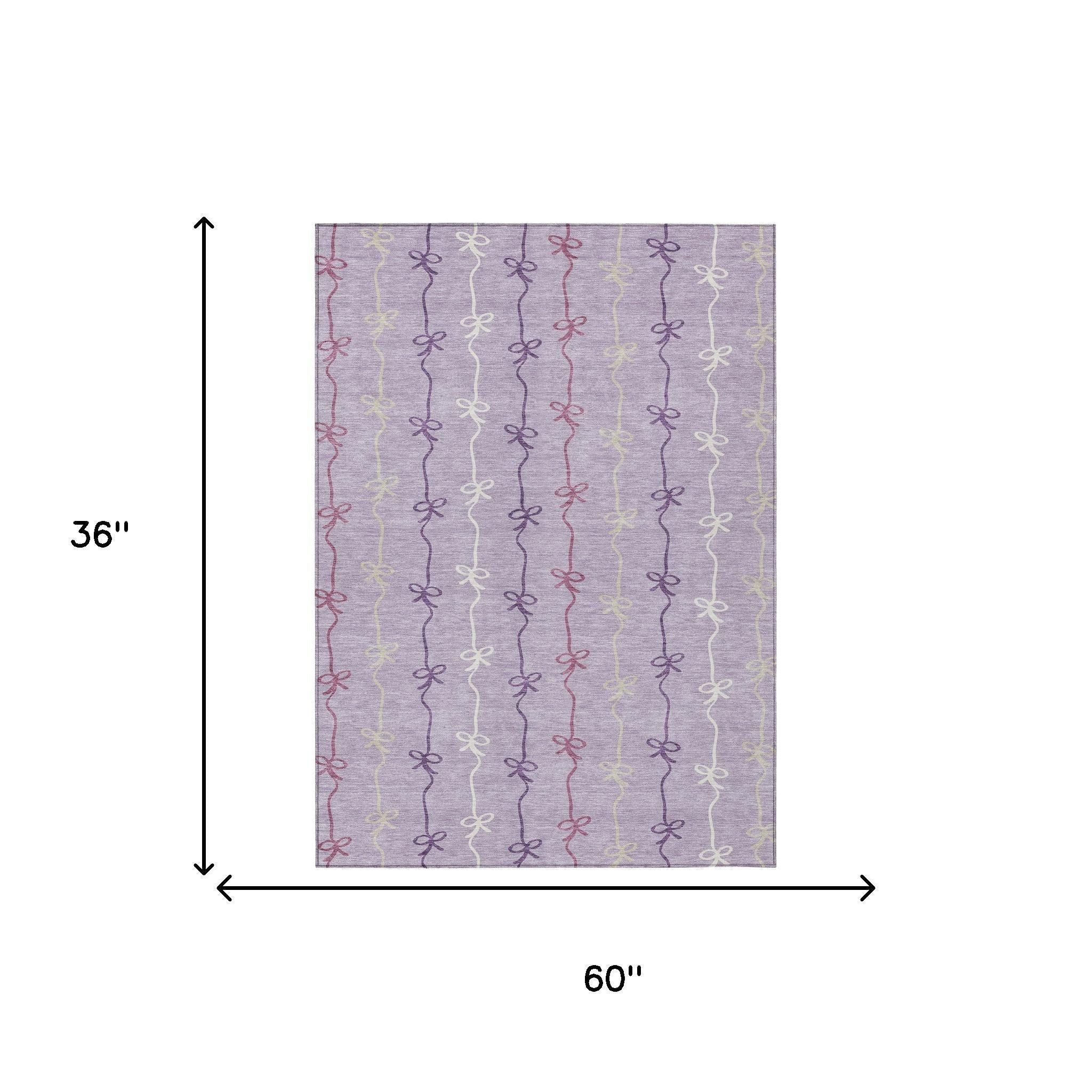 Lavender tablecloth with multicolored bow print, measuring 36"x60", perfect for festive occasions.