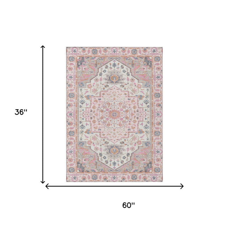 Pink and gray oriental area rug shown with size 60 in by 36 in.