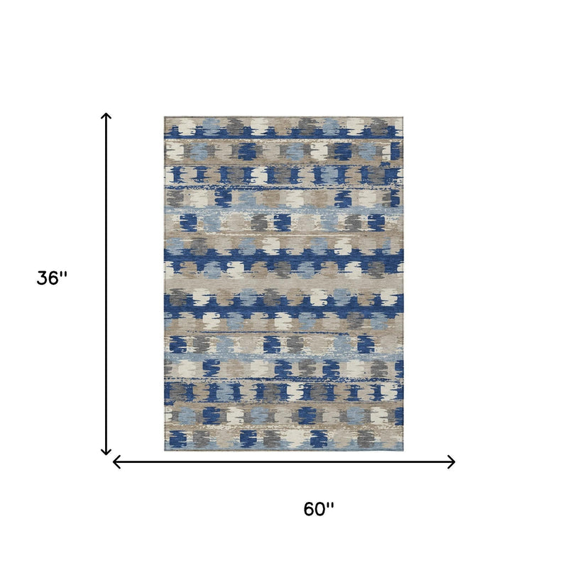 3 ft x 5 ft abstract washable area rug, navy blue and charcoal on beige.