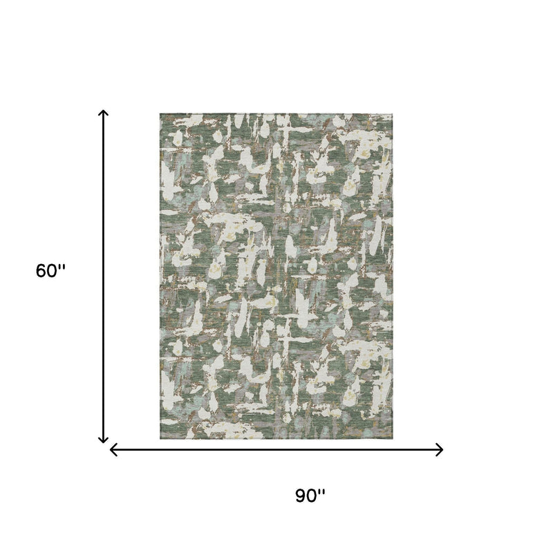 Area rug shown with size guide: 90 in by 60 in, abstract green and beige pattern