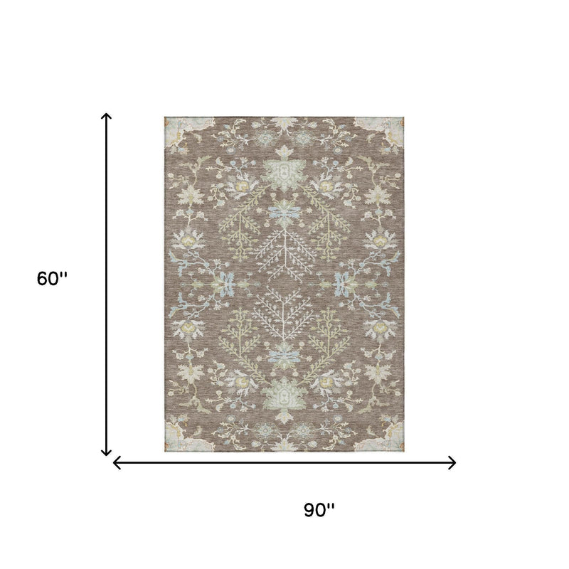 Taupe oriental area rug with ivory floral pattern, shown with 90 in by 60 in dimensions