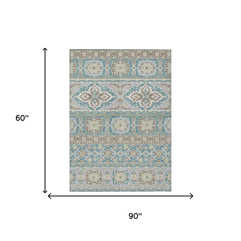 Rectangular teal and green tribal area rug shown with 90 x 60 in dimensions