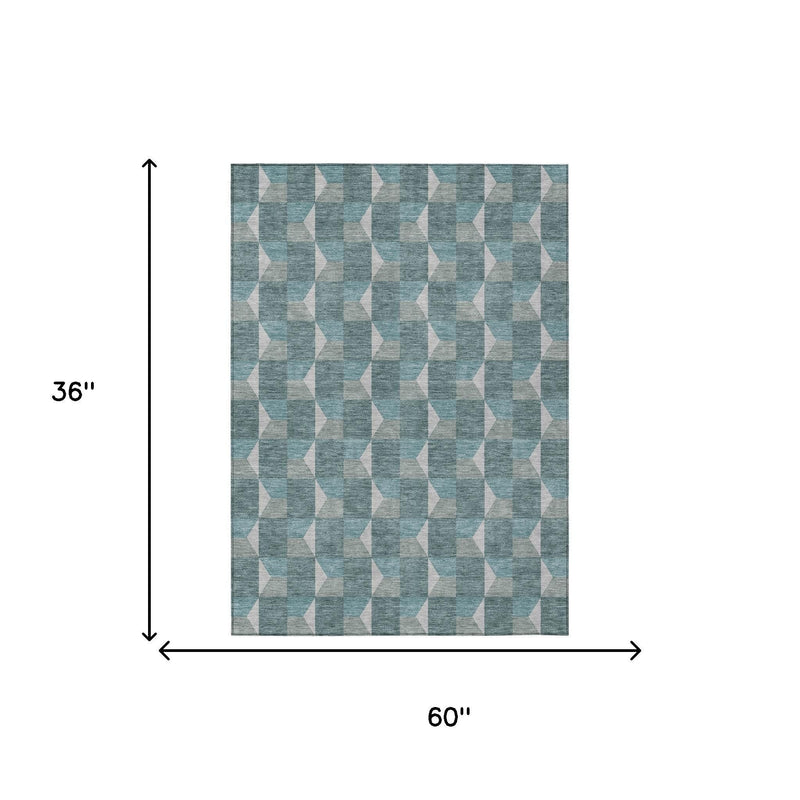 Area rug sizing graphic: 60 x 36 in, teal/gray with white geometric pattern