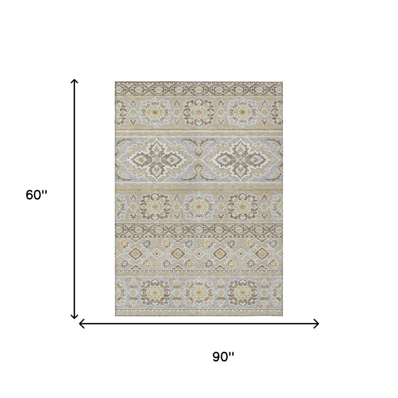 90 x 60 beige and ivory tribal area rug with size guide arrows and border.