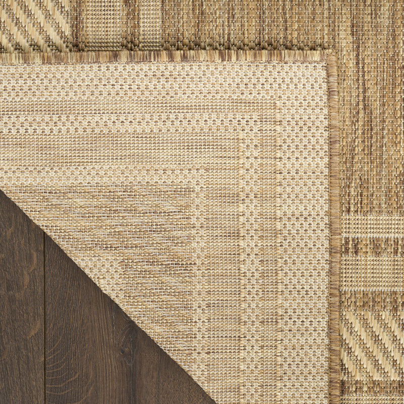Natural geometric area rug with diamond-like texture and stitched edge binding