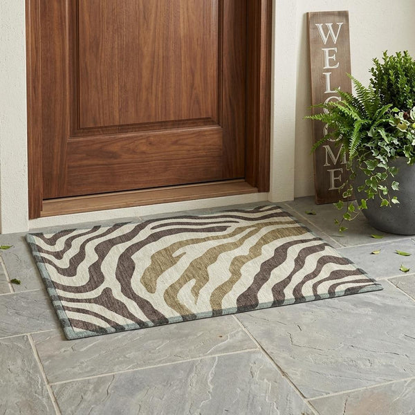 Zebra print area rug with brown, beige, and dark stripe pattern on floor