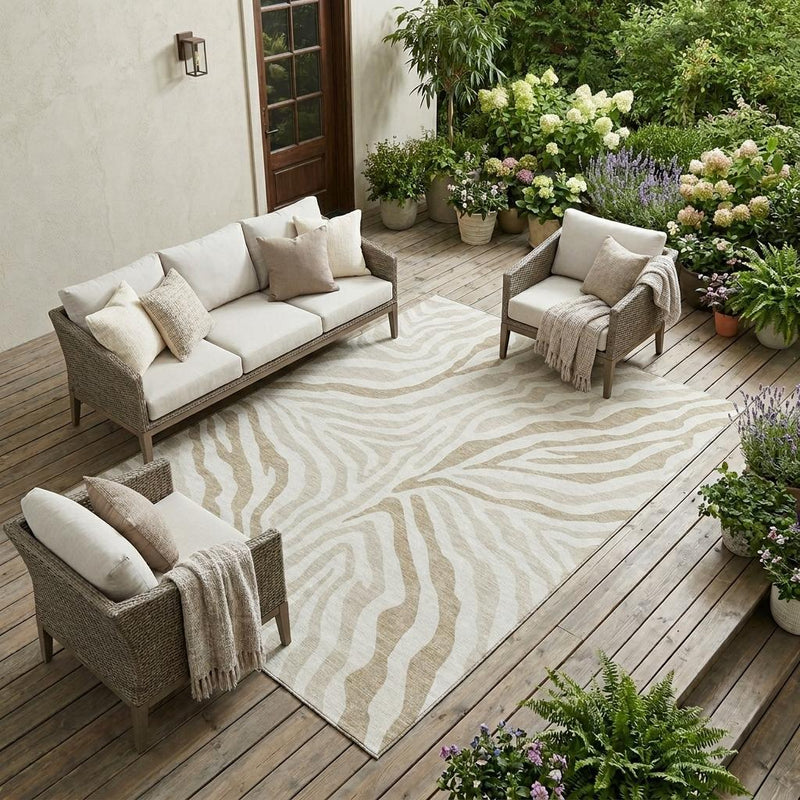 Ivory and beige zebra print area rug on outdoor wooden patio with seating