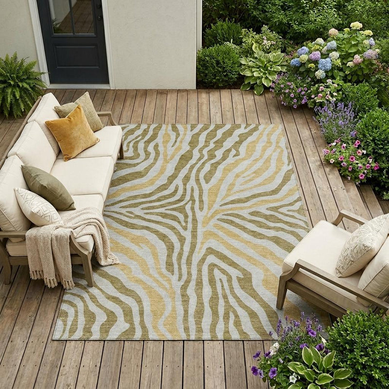 Zebra-pattern area rug on outdoor deck with tan and cream tones