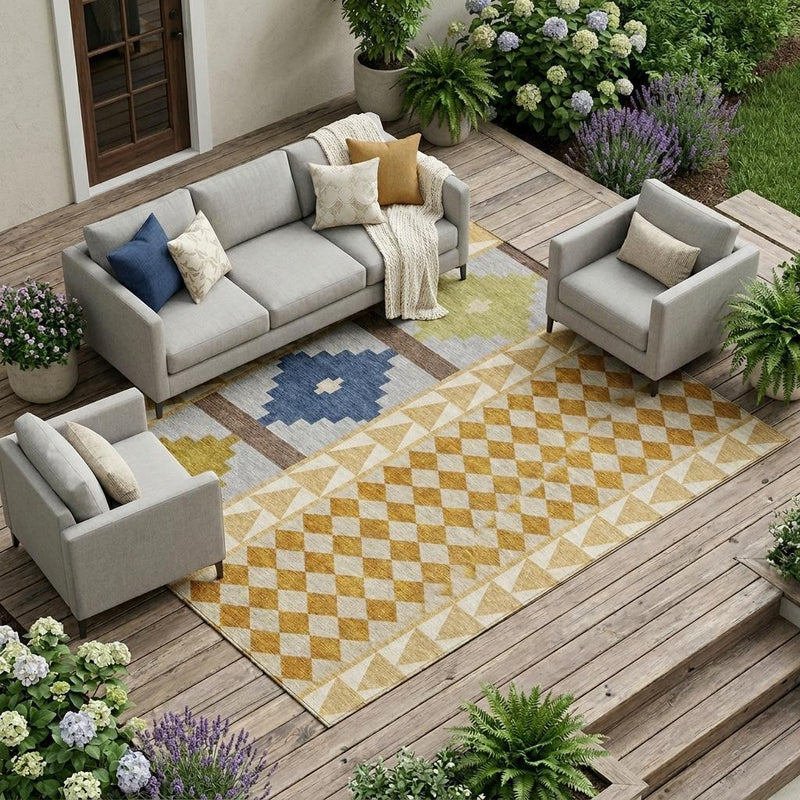 Southwestern area rug with ivory, tan, blue and mustard diamond patterns