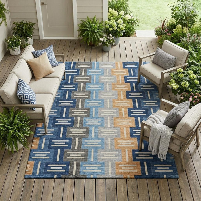Geometric blue area rug with navy, gray and tan vertical bar pattern