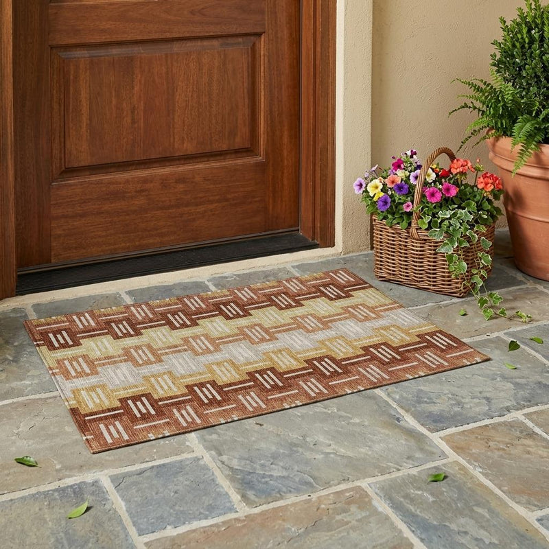 Geometric indoor outdoor area rug with brown and cream stripe pattern