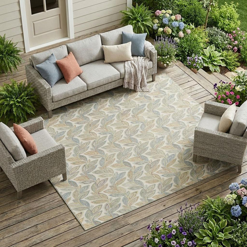 Botanical leaf area rug on outdoor patio floor with multicolor leaf pattern