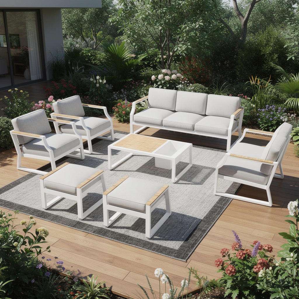 Outdoor metal sofa seating set with light gray cushions and white table bench pieces