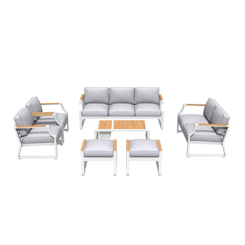 Seven-piece outdoor seating group with gray cushions, white frames, and wood tabletop