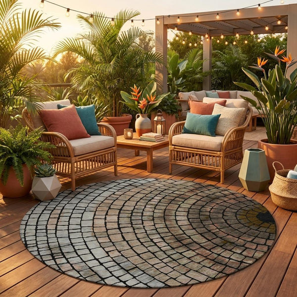 Round indoor/outdoor area rug with geometric brick pattern in beige, taupe, and dark gray
