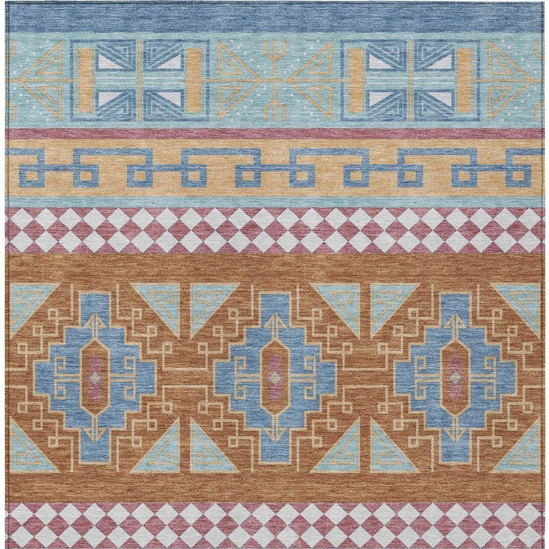 Geometric tribal area rug close-up with blue top border, tan field, and maroon diamond stripe