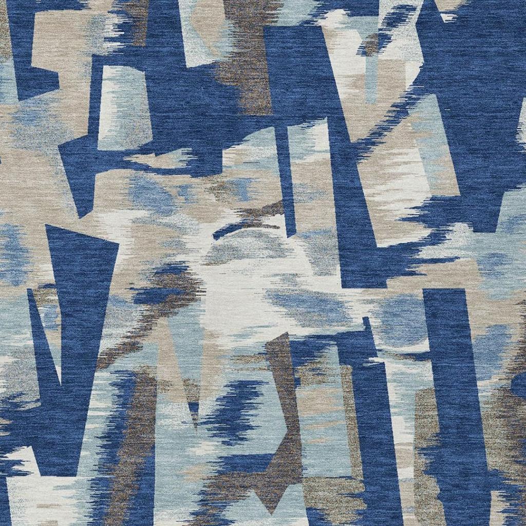 Abstract area rug close-up with blue and beige stacked block shapes