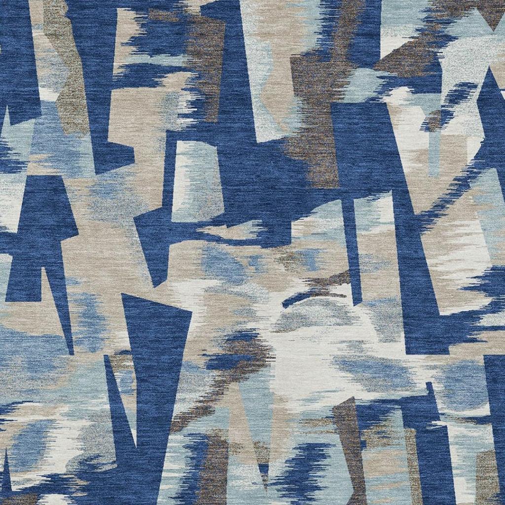 Blue and beige abstract area rug close-up with bold blocks and brushstroke shading
