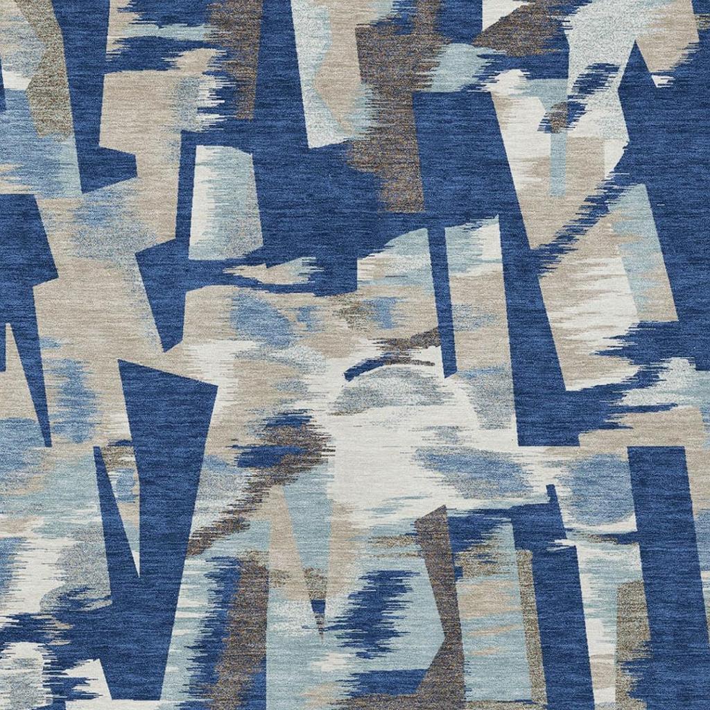 Blue and beige abstract area rug close-up showing dense geometric blocks and lines