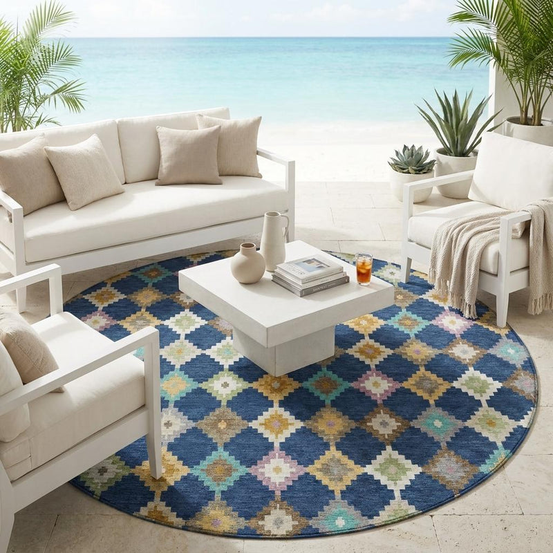 Round indoor/outdoor area rug with blue diamond pattern and multicolor accents.
