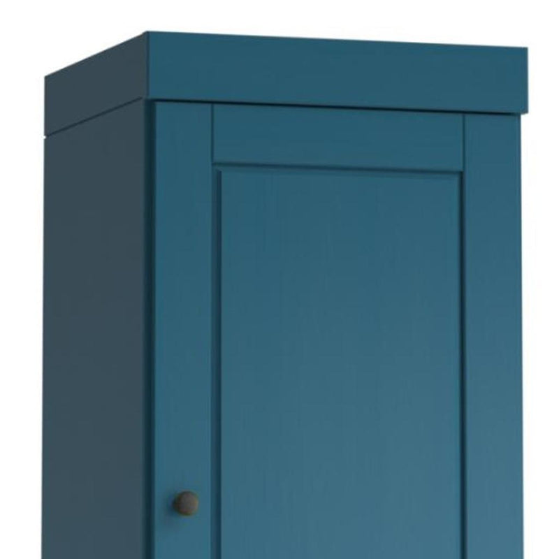 Teal cabinet door panel with round knob and raised frame trim.